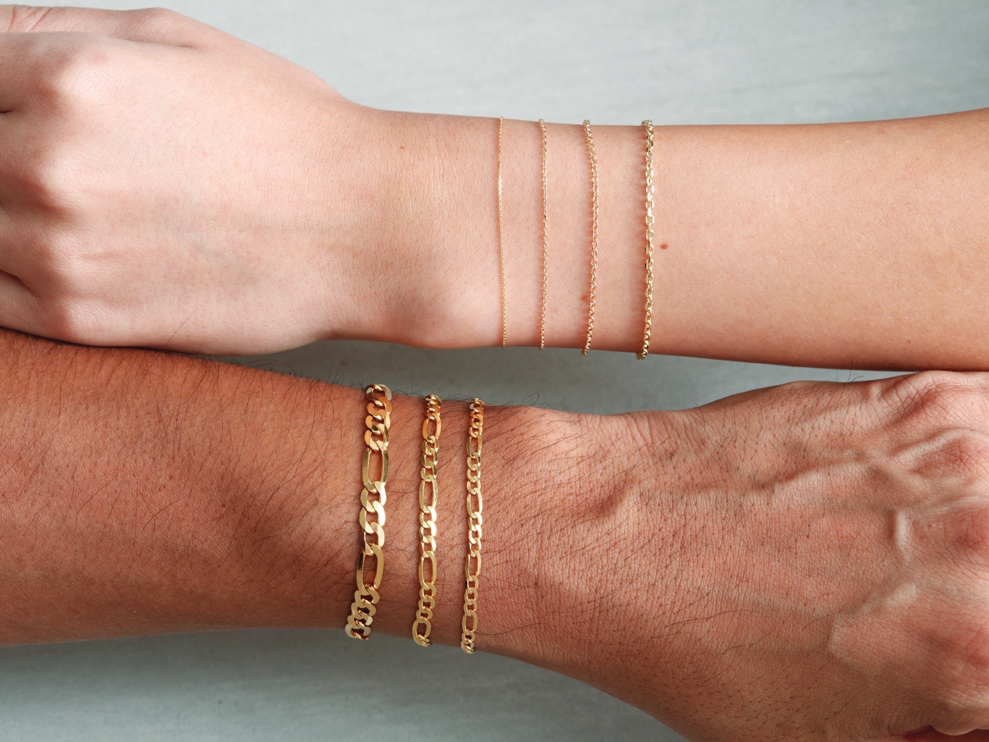 Bracelets collection at Lu’Ro Jewelers featuring delicate chains and timeless bangles