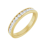 1/2 ctw channel-set round brilliant cut diamond band in 14K yellow gold, 3.3 mm width, angle view