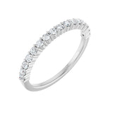 1/3 ctw shared-prong round brilliant cut diamond band in 14K white gold, 1.8 mm width, angle view