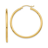 35 mm slim hoop earrings in solid 14K yellow gold, close-up view
