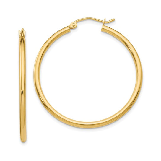 35 mm slim hoop earrings in solid 14K yellow gold, close-up view