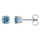 4 mm blue topaz solitaire stud earrings in solid 14K white gold, front and side view